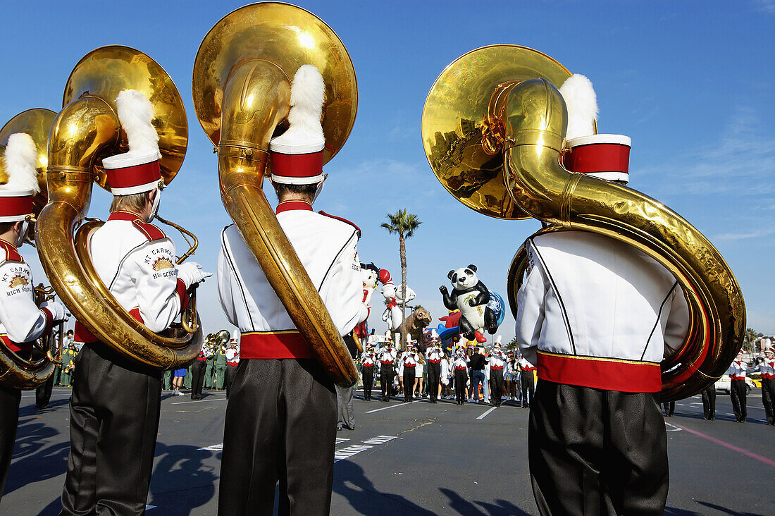 Sousaphone players practicing before the Big Bay Balloon Parade. San Diego, California.