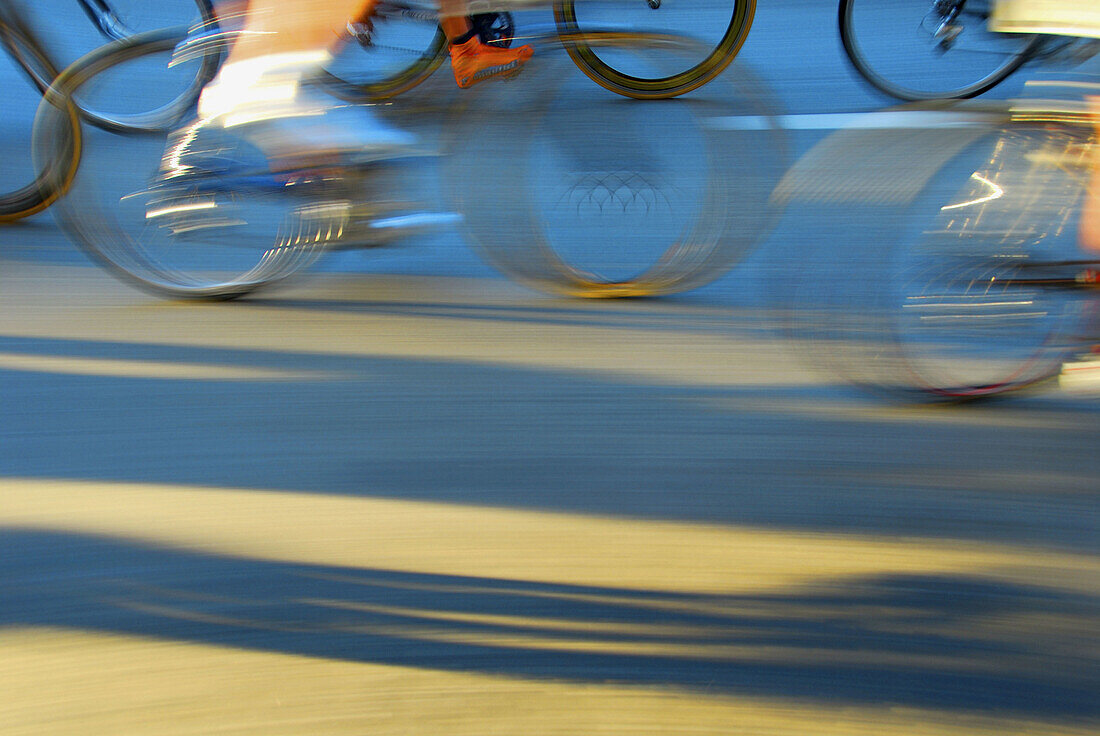 bike racers on street racing