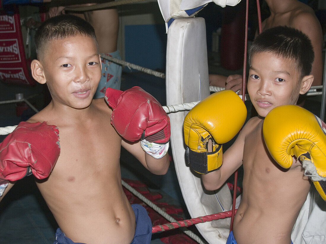 Boys training as kickboxers in a gym. Phnom Penh, Cambodia