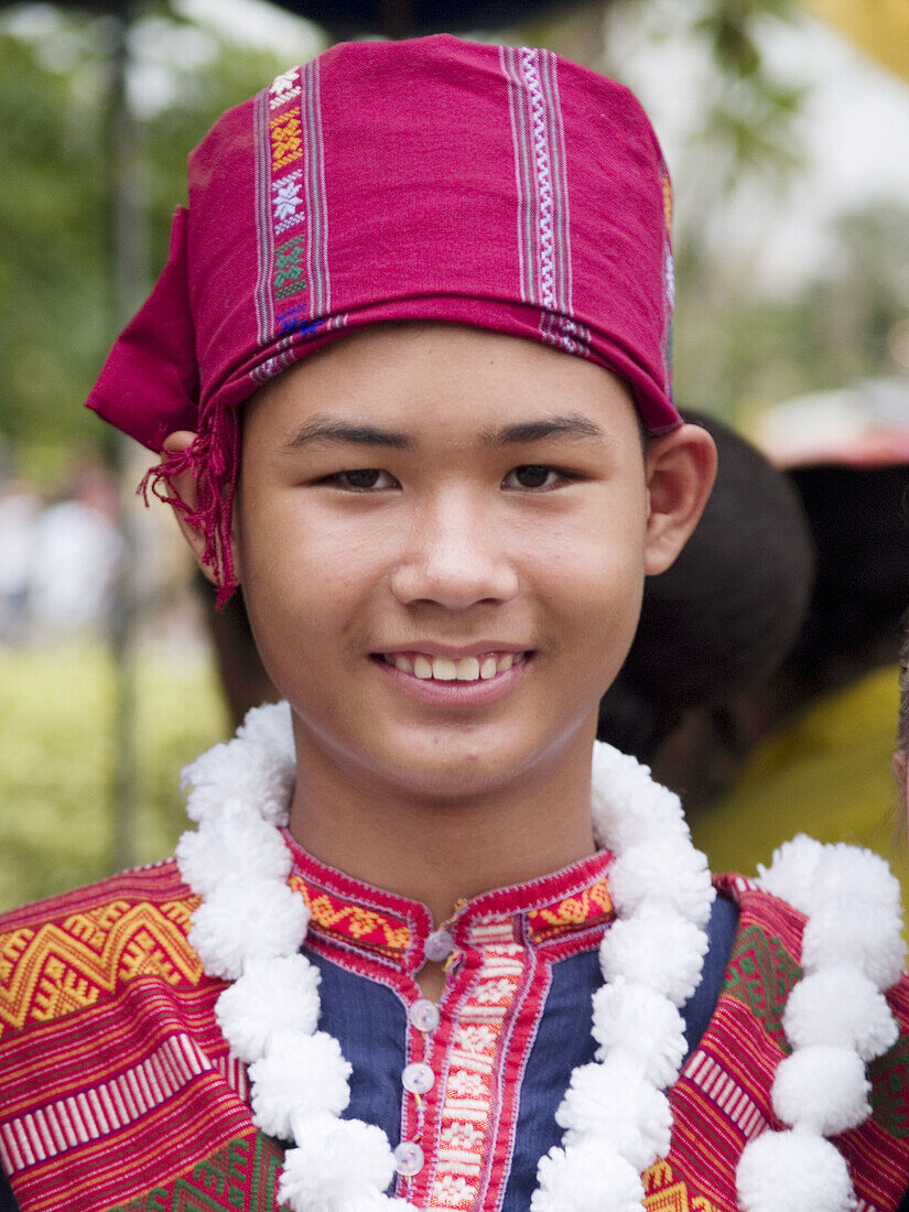 Boy in traditional clothing, Ubon Ratchatani Candle Festival, Thailand