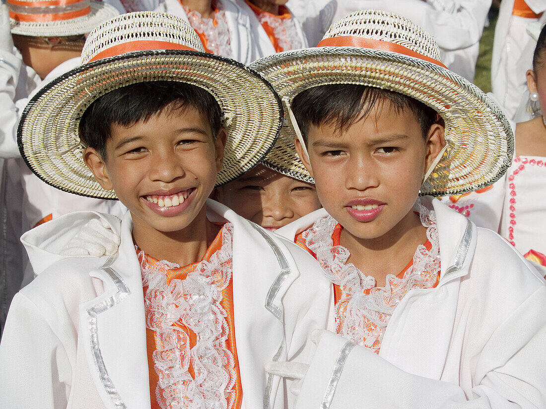 dressed up and full of smiles, young boys at the Sinulog Festival, Cebu, Philippines