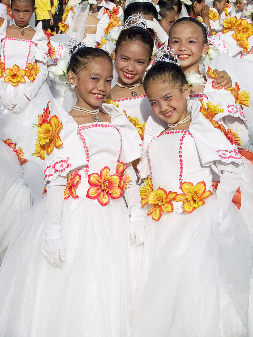 the smiling girls in white gowns, Sinulog Festival, Cebu, Philippines
