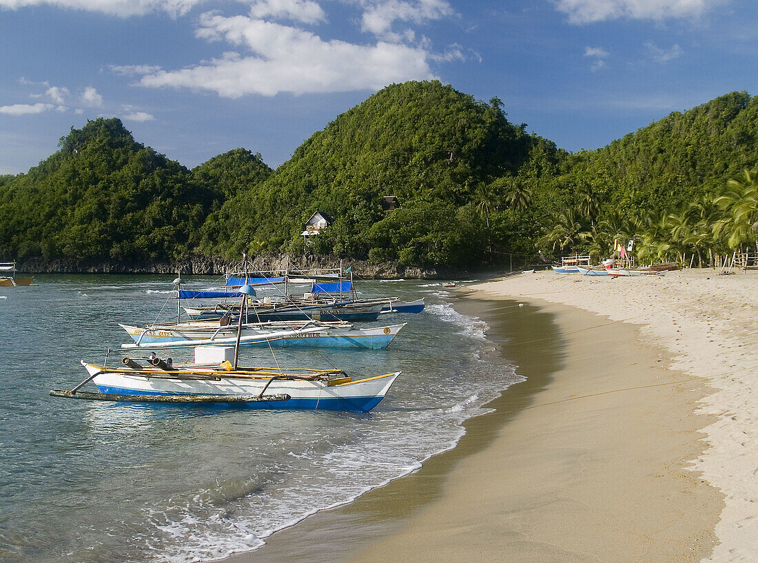 boats on Sugar Beach, Negros, Philippines