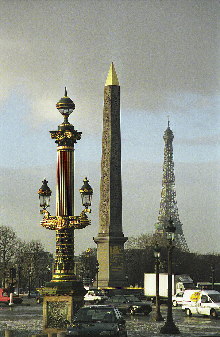 Eiffel Tower, obelisk at Place to la Concorde, and light post in Paris, France.