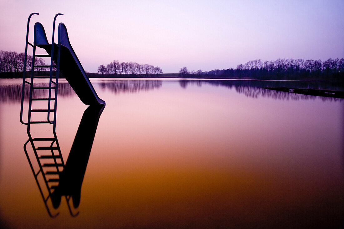 Slide in a swimming lake, Schleswig-Holstein, Germany