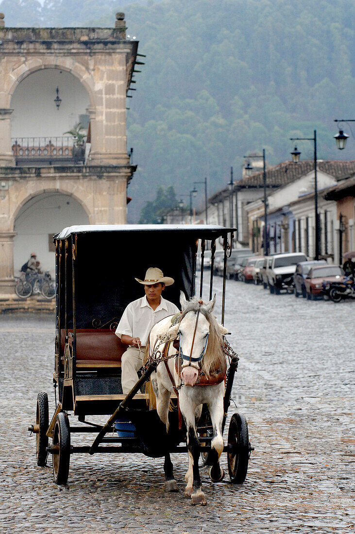 Horse carriage at Parque Central, Antigua, Guatemala, Central America