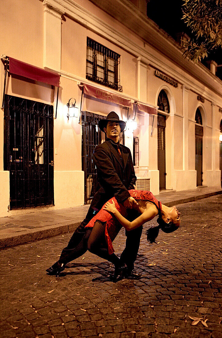 Young couple dancing the tango, San Telmo, Buenos Aires, Argentina, South America