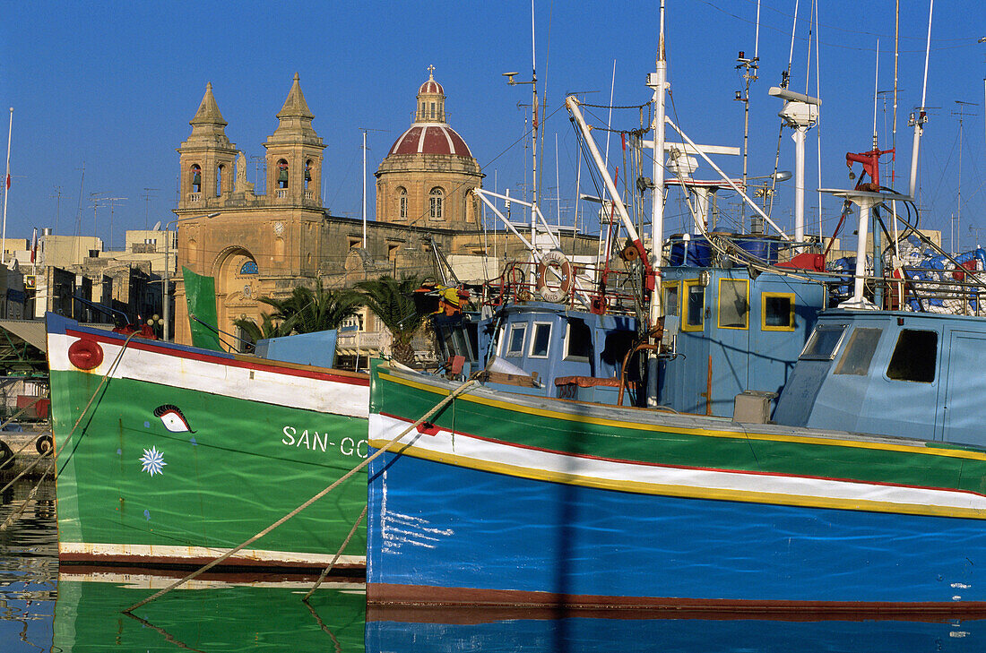 Marsaxlokk harbour and luzzu boats. Malta