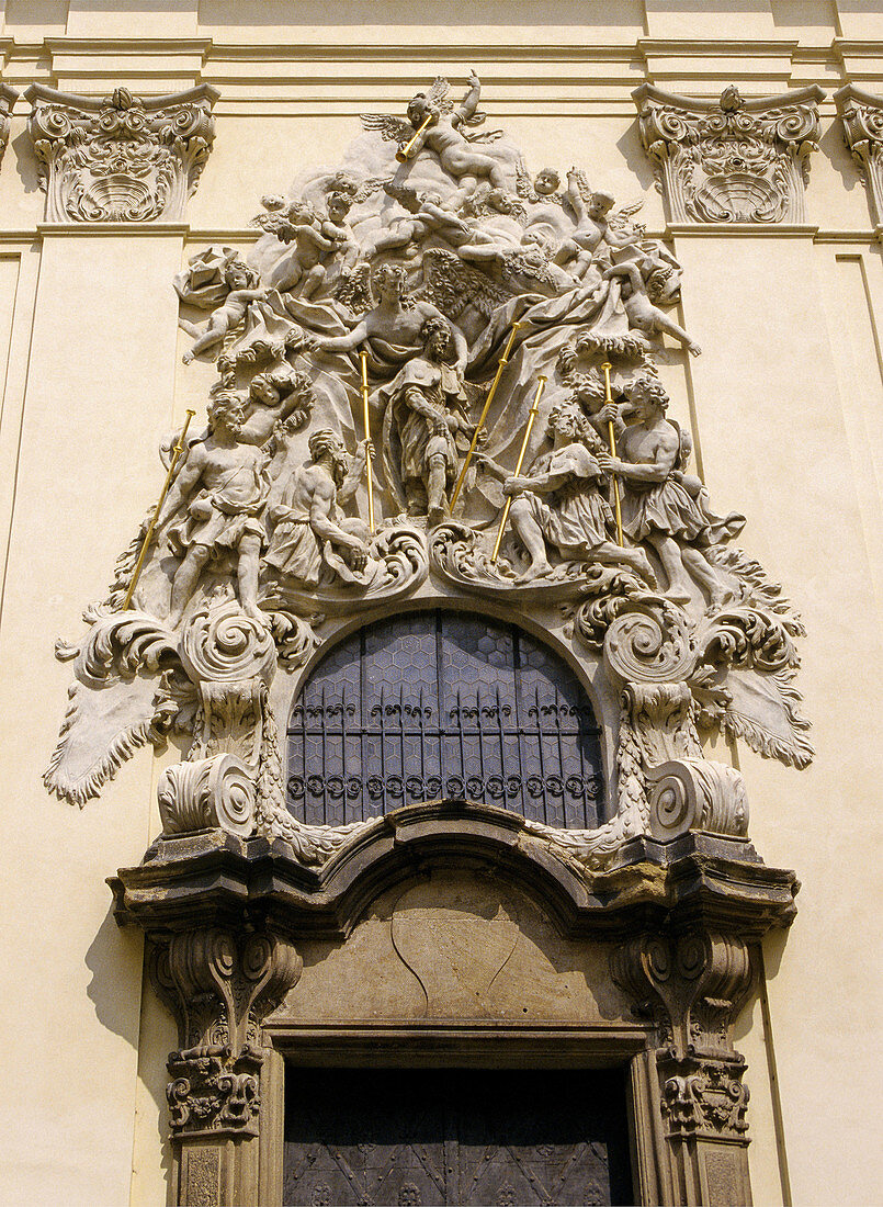Baroque stucco relief over the entrance to St James Church in Prague, Czech Republic