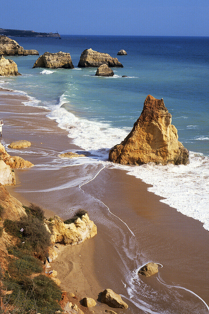 Beach, cliffs. Praia da Rocha. Algarve. Portugal.