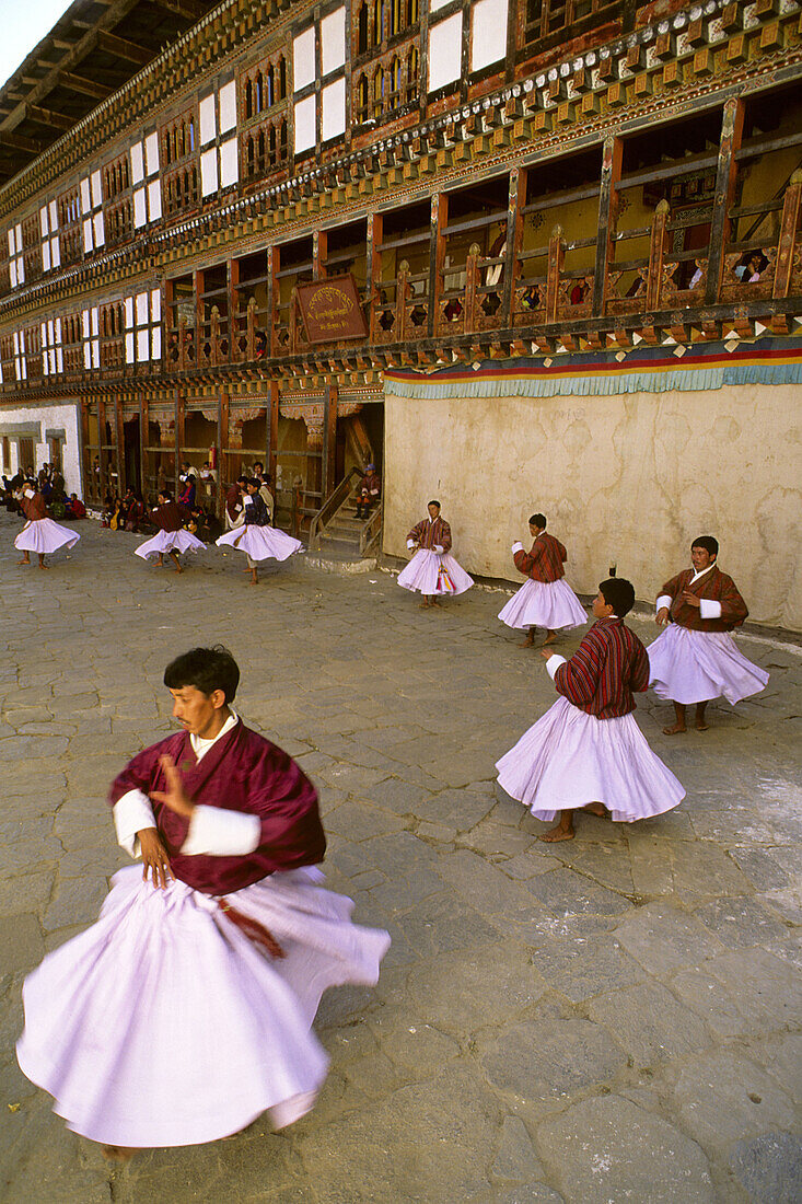 Religious dancers. Festival. Tshechu. Tongsa. Bhutan.