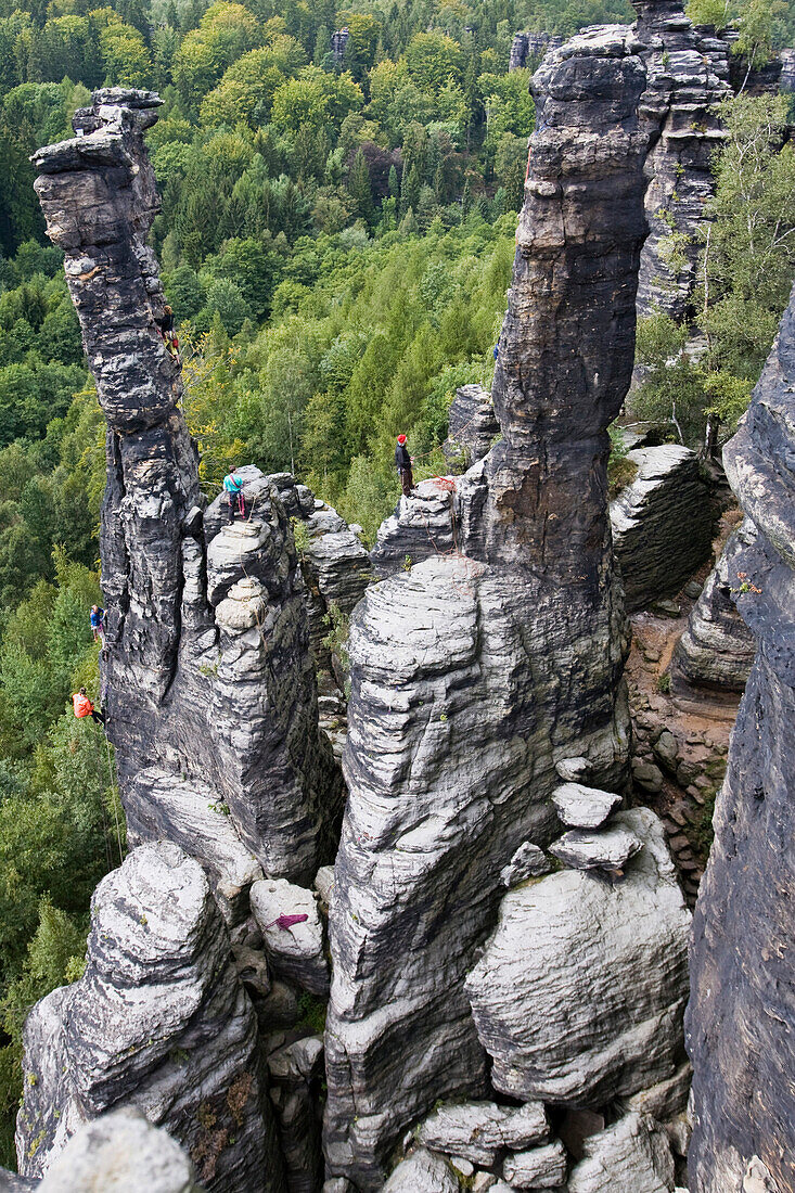 Climbers on Kleine and Grosse Herkulessaule, Bielatal, Saxon Switzerland, Saxony, Germany