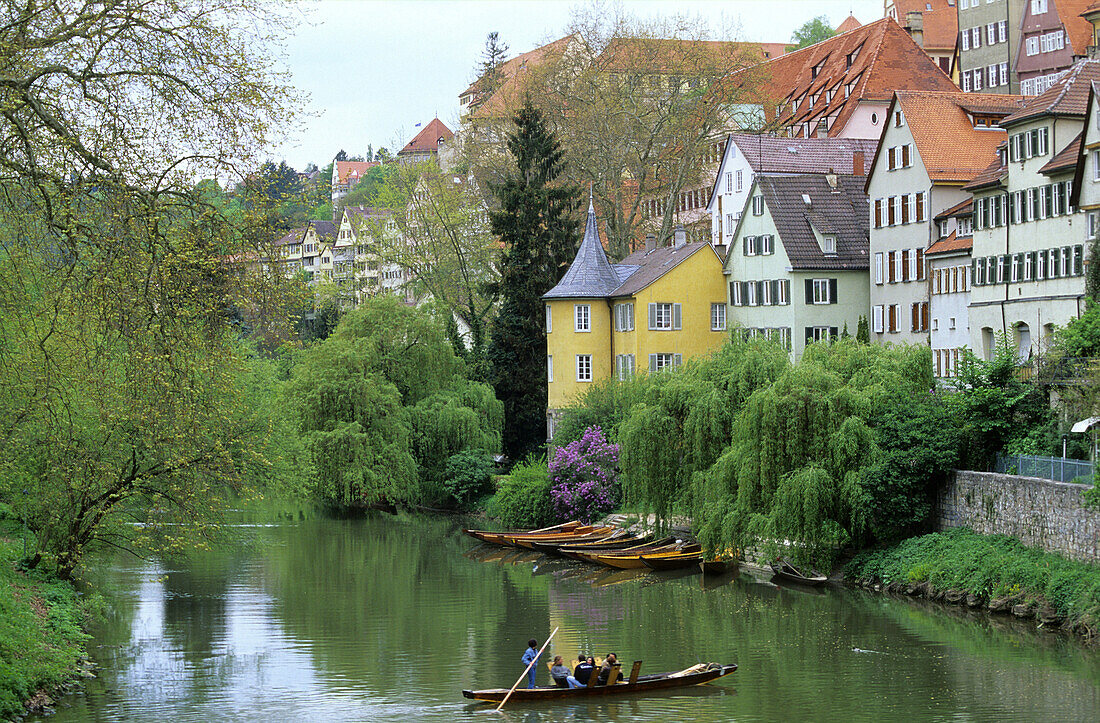 Hölderlin tower and punts at river Neckar, Tubingen, Baden-Wurttemberg, Germany