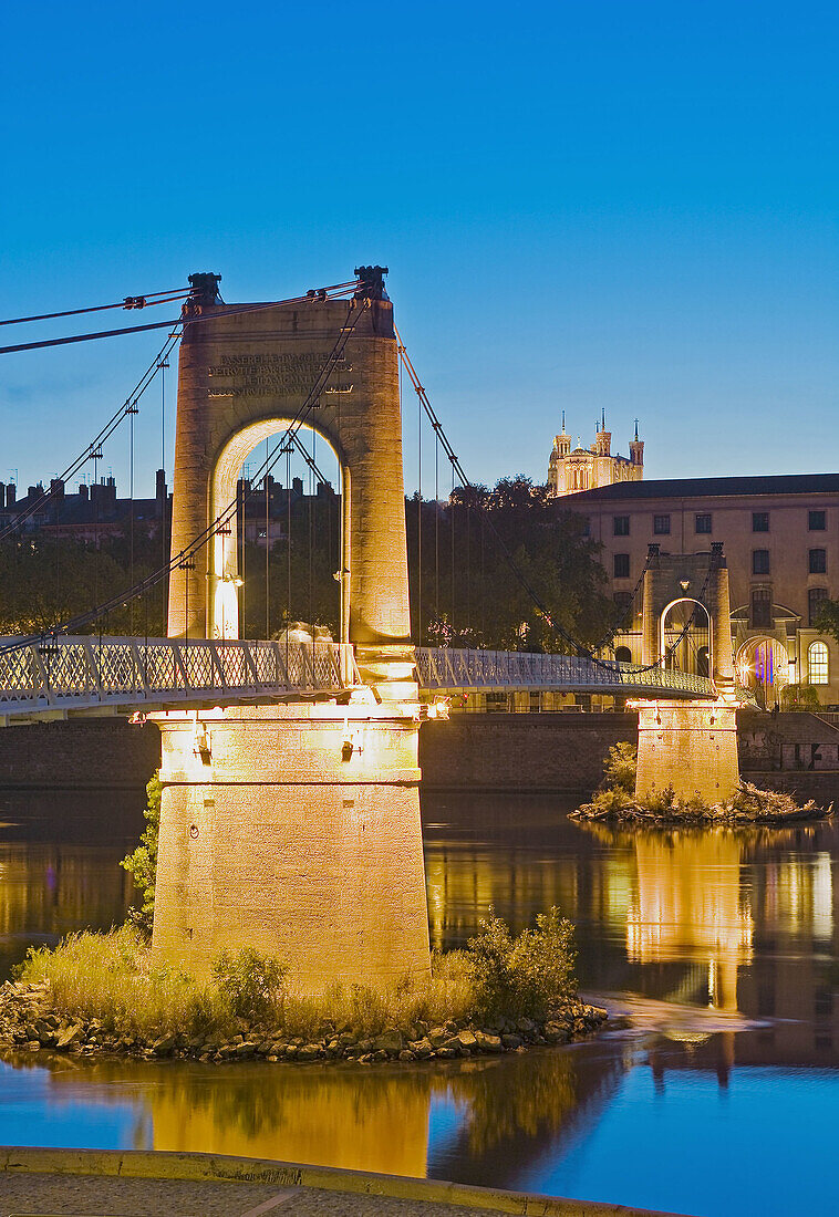 Passerelle (footbridge) du College' over Rhone river and Basilica of Notre-Dame de Fourvière in background, Lyon. Rhône-Alpes, France