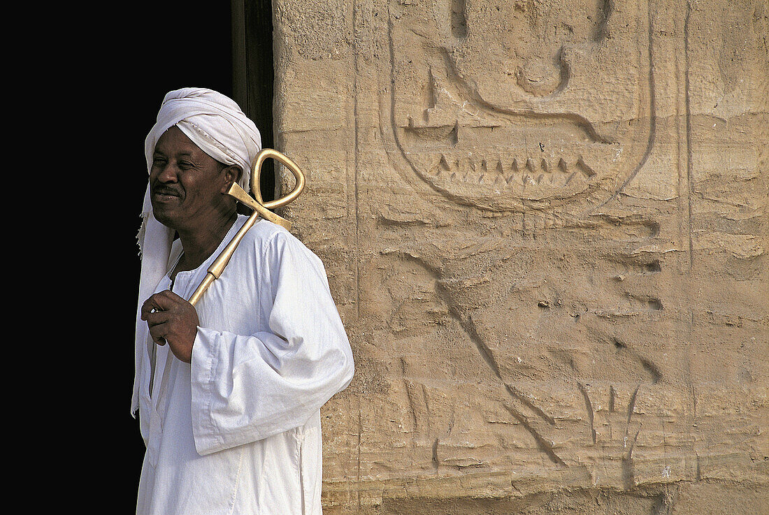 Abou Simbel warden holding the Ramasses temple key in shape of 'Ka'. Nubia . Egypt.