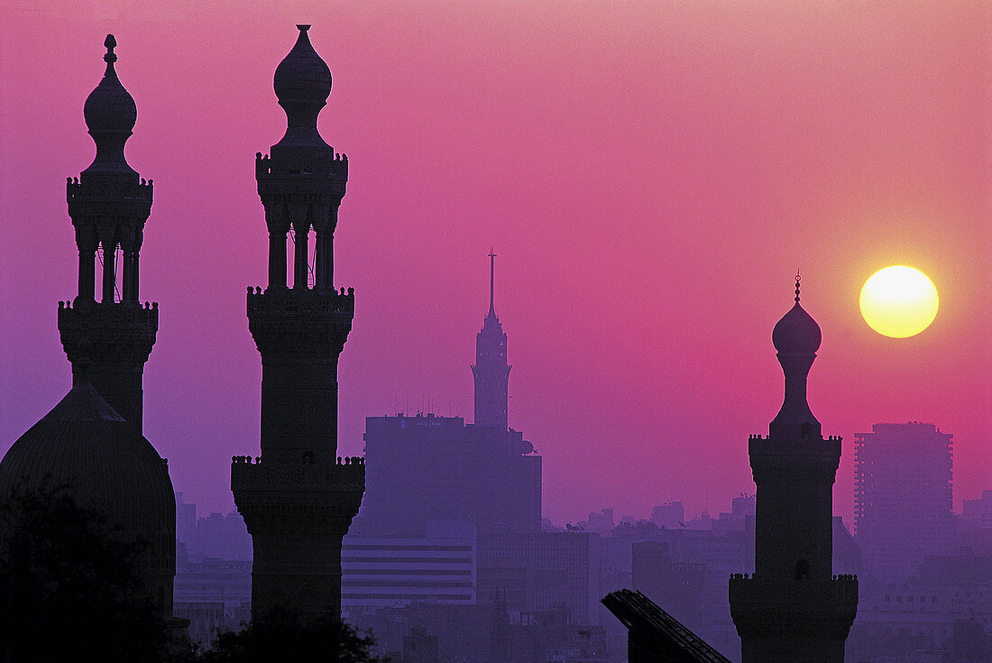 Minarets of Hassan mosque at sunset, view from citadel .City of Cairo. Egypt.
