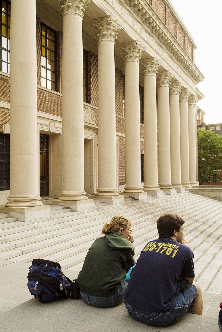 Rear view of students at Harvard University Library, Cambridge, Massachusetts, USA