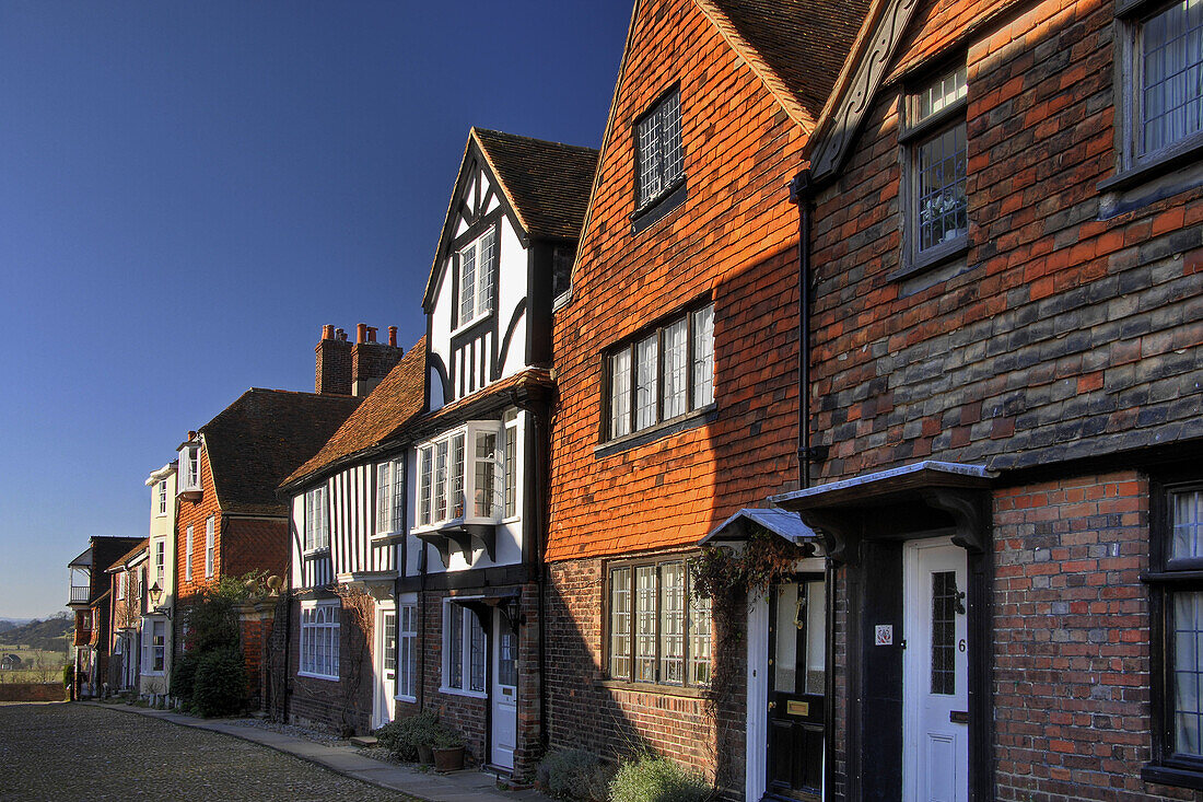 street scene showing old medieval buildings in historic five cinque port Rye East Sussex england uk europe