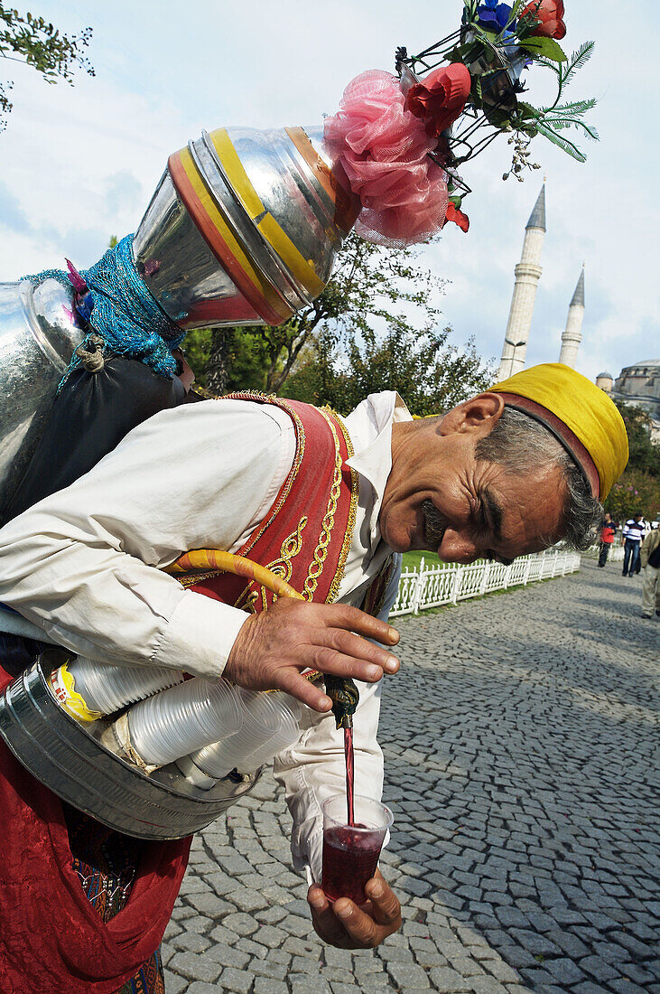 Drinks vendor, St. Sophia mosque. Istanbul. Turkey