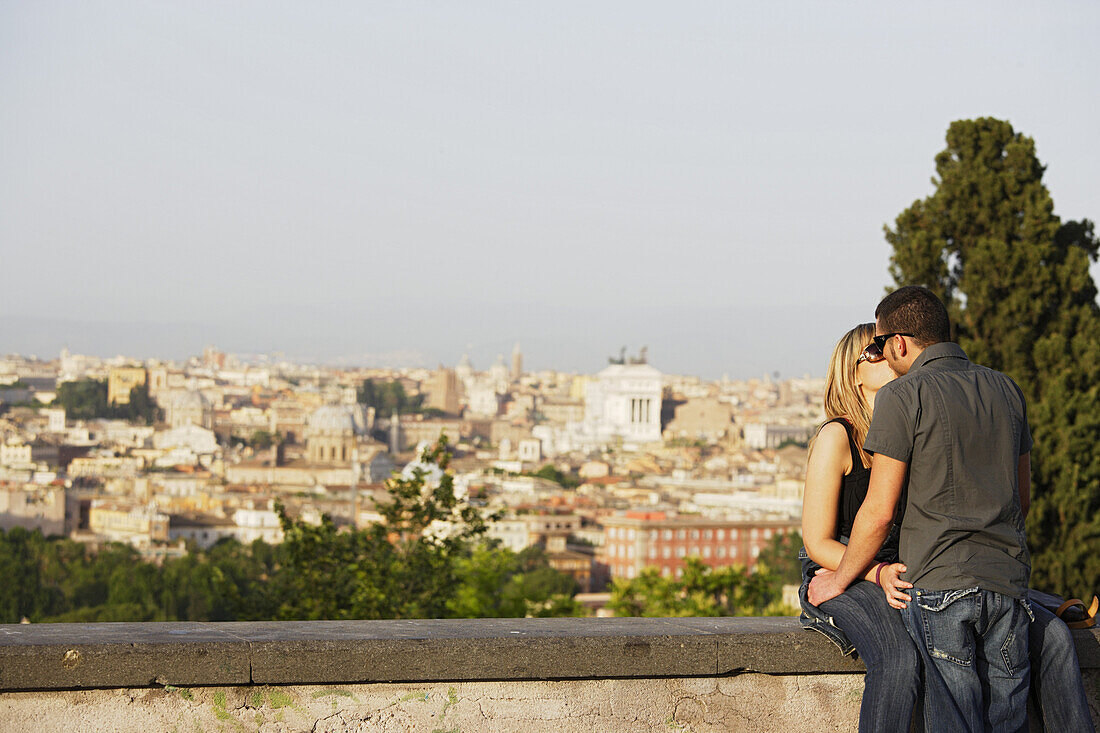 Young couple kissing  on Janiculum Hill, Rome, Italy