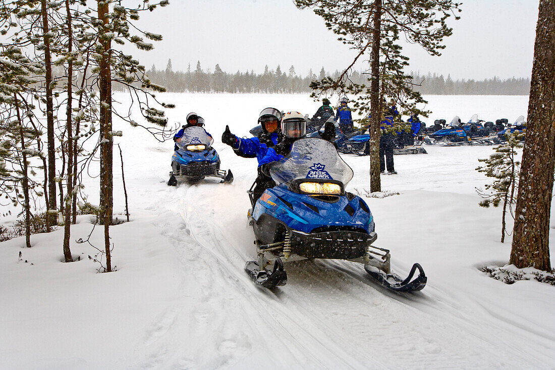 Snowmobile tour through snowy landscape, Rovaniemi, Lapland, Finland, Europe