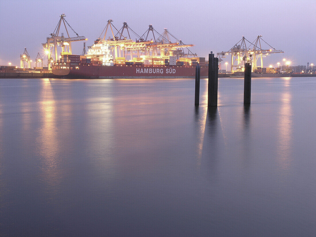 Cargo ship in conatiner port, Hamburg, Germany