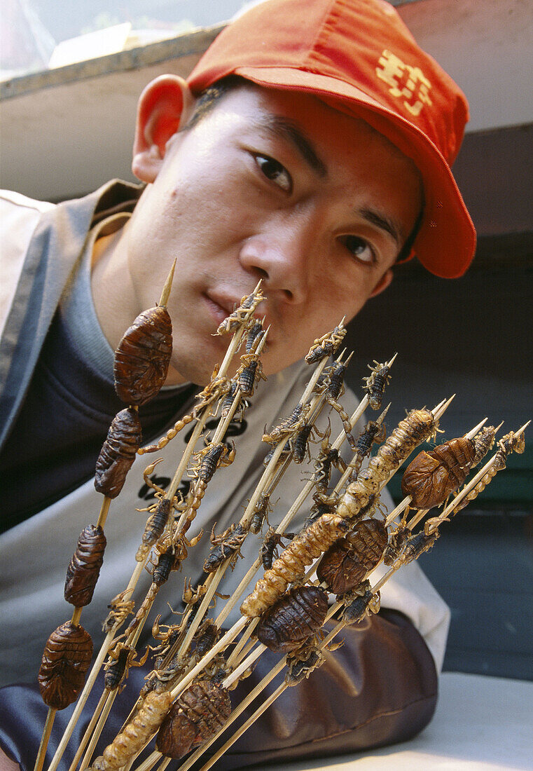 Grilled scorpions, sea horses and beetles to eat. Beijing. China