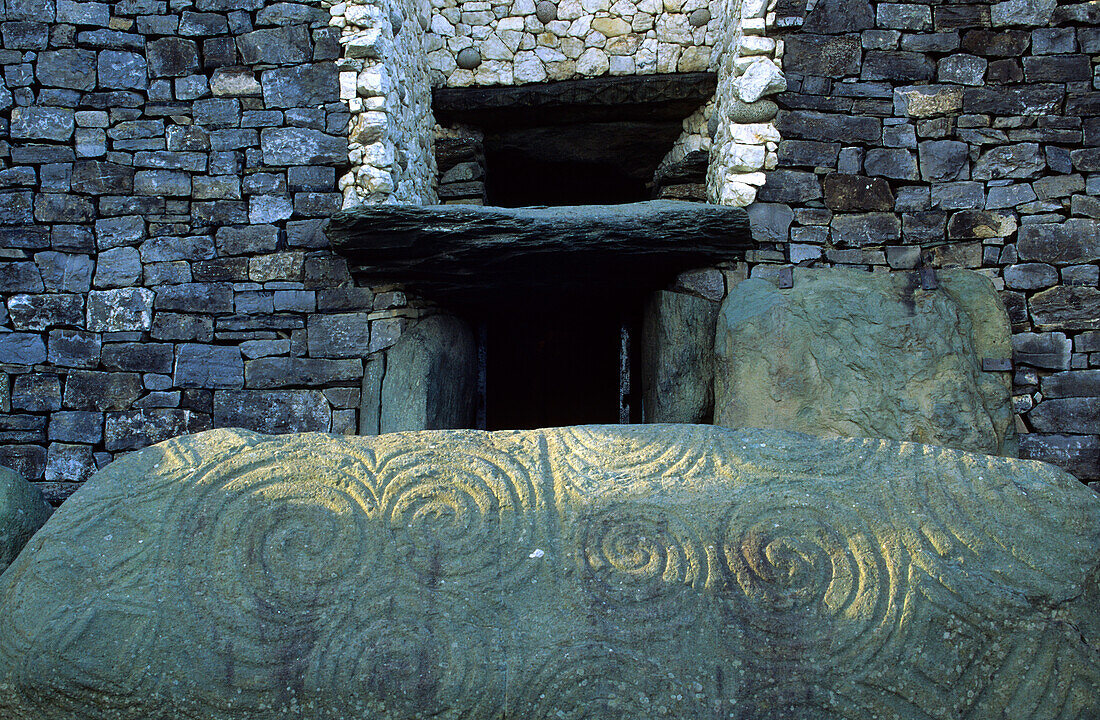 An ornated stone at a gravesite, Newrange, County Meath, Ireland, Europe