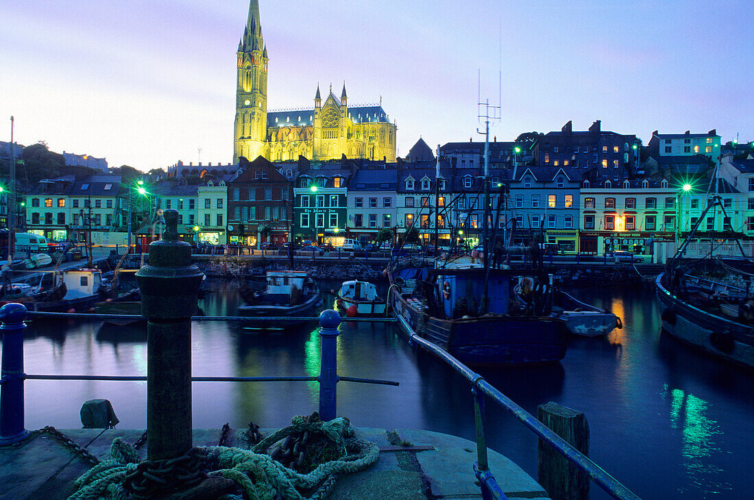 Old Town with illuminated St. Colman cathedral and harbour in the evening, Cobh, County Cork, Ireland, Europe