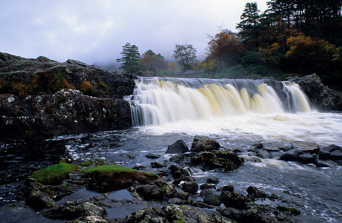 View at the Aasleagh Falls under clouded sky, Connemara, County Mayo, Ireland, Europe