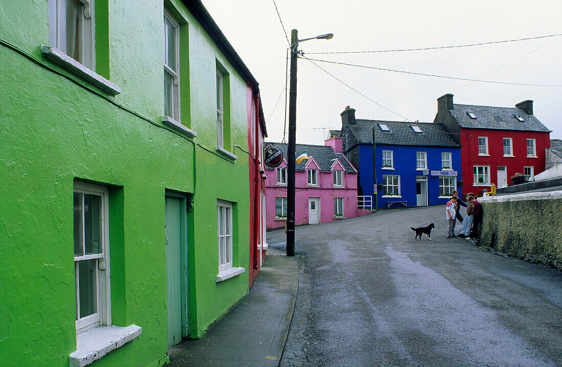 Colourful houses under clouded sky, Eyeries, Beara peninsula, County Cork, Ireland, Europe