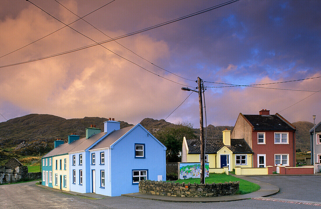 Colourful houses under clouded sky, Allihies, Beara peninsula, County Cork, Ireland, Europe