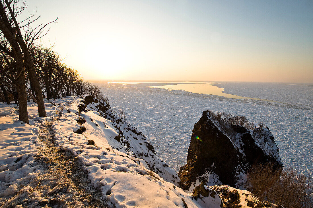 Coastline in winter at sunset, Hokkaido, Japan, Asia