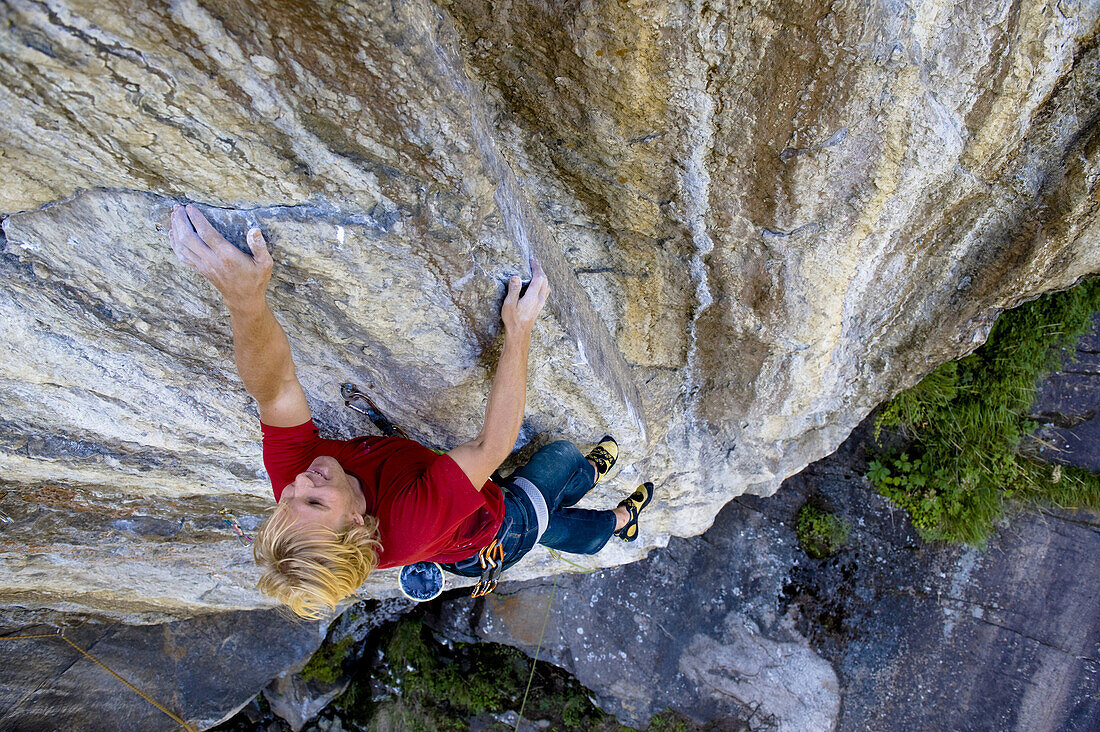 Mid adult woman rock climbing, Oetztal, Tyrol, Austria