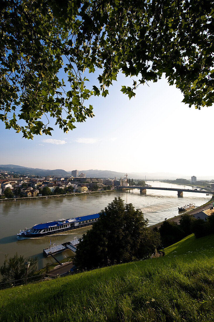 View from Schloßberg at the Danube with excursion boat and Nibelungen bridge, Linz, Upper Austria, Austria