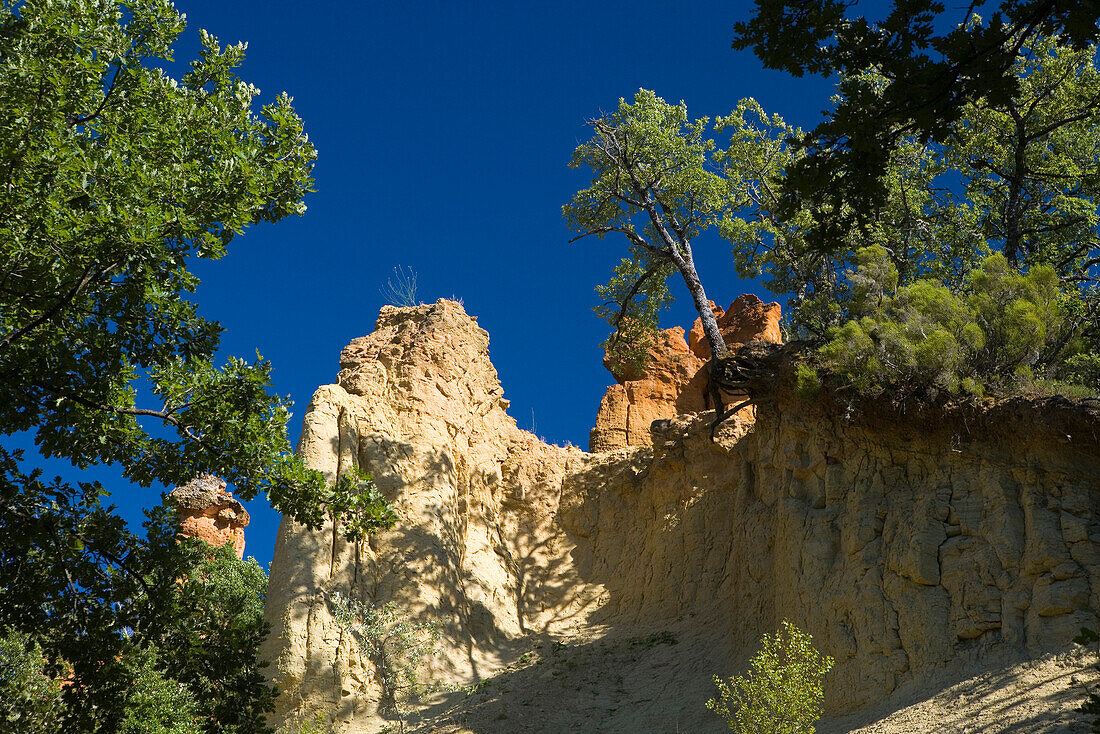 Colorado Provencal, rocks of ochre under a blue sky, Rustrel, Vaucluse, Provence, France