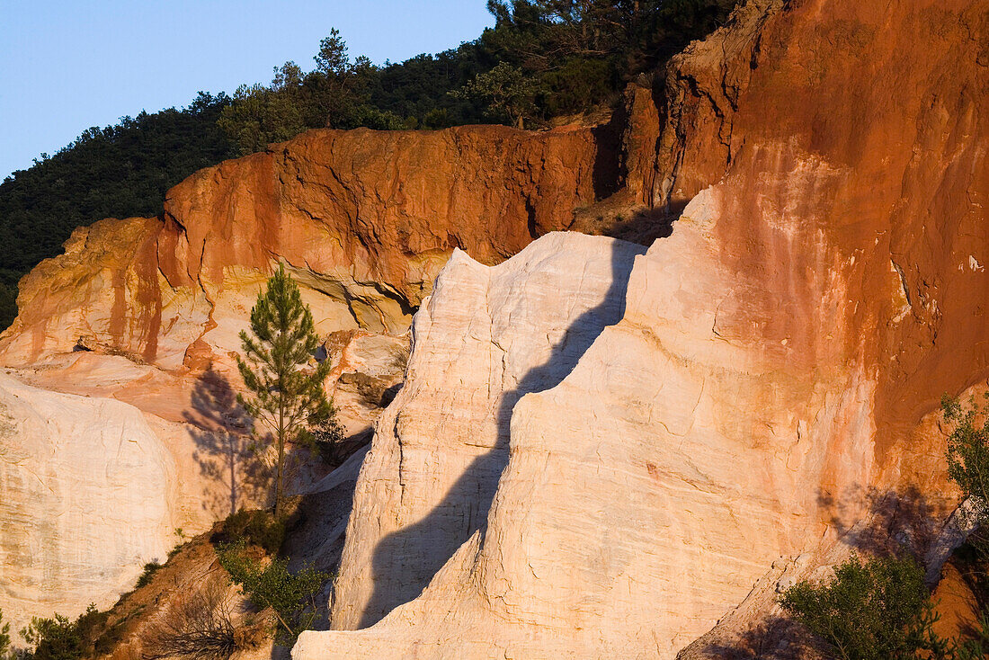 Colorado Provencal, rocks of ochre under a blue sky, Rustrel, Vaucluse, Provence, France