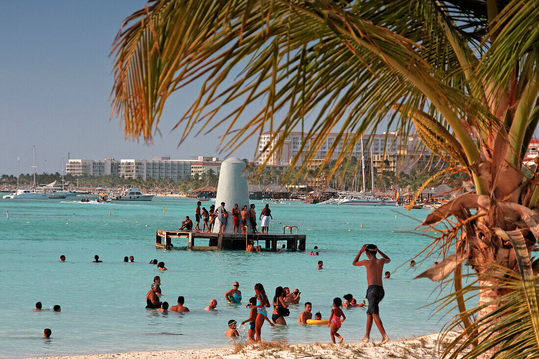 Aruba, Palm Beach, West Indies, Dutch Carribean, Central America, local people at the beach on sunday