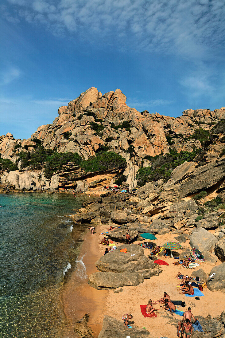 Italy Sardinia Capo Testa Cala Spinosa, sand beach with cristal clear water surrounded by bizarre rocks