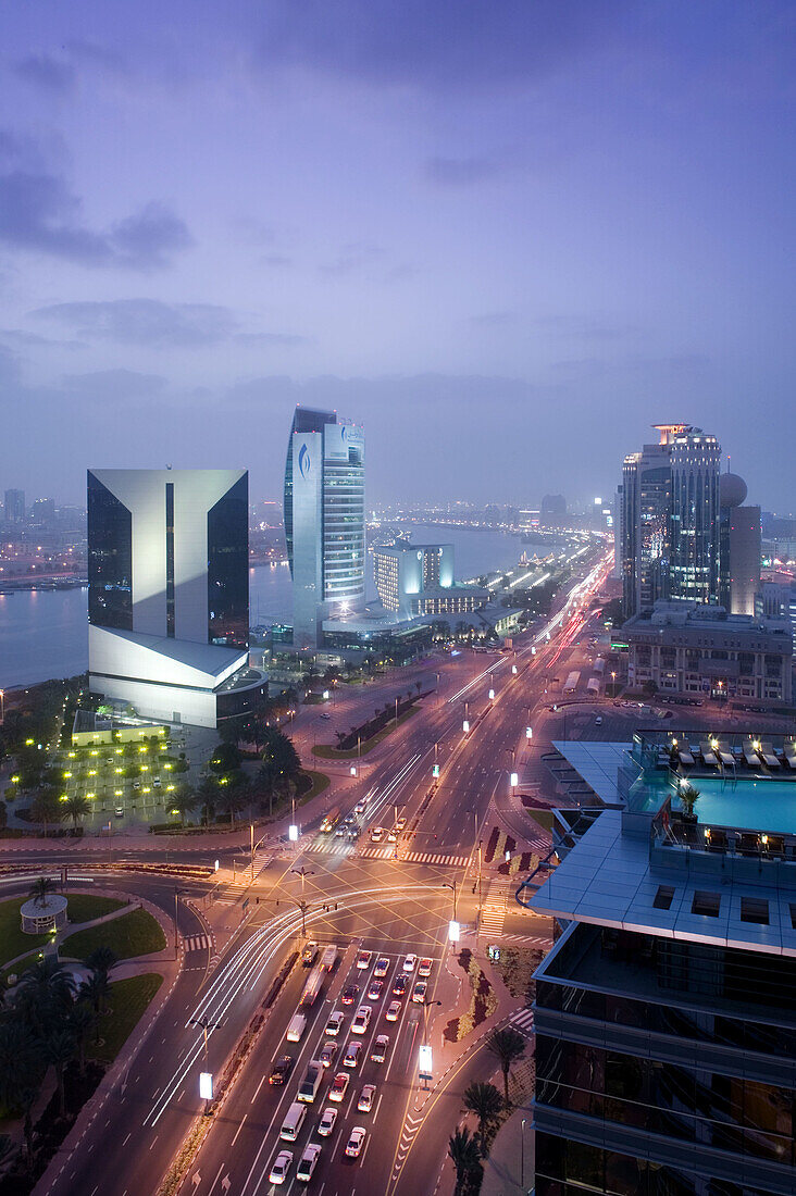 UNITED ARAB EMIRATES (UAE)-DUBAI-Deira: Aerial View of Deira Buildings along Dubai Creek and Baniyas Road/ Evening