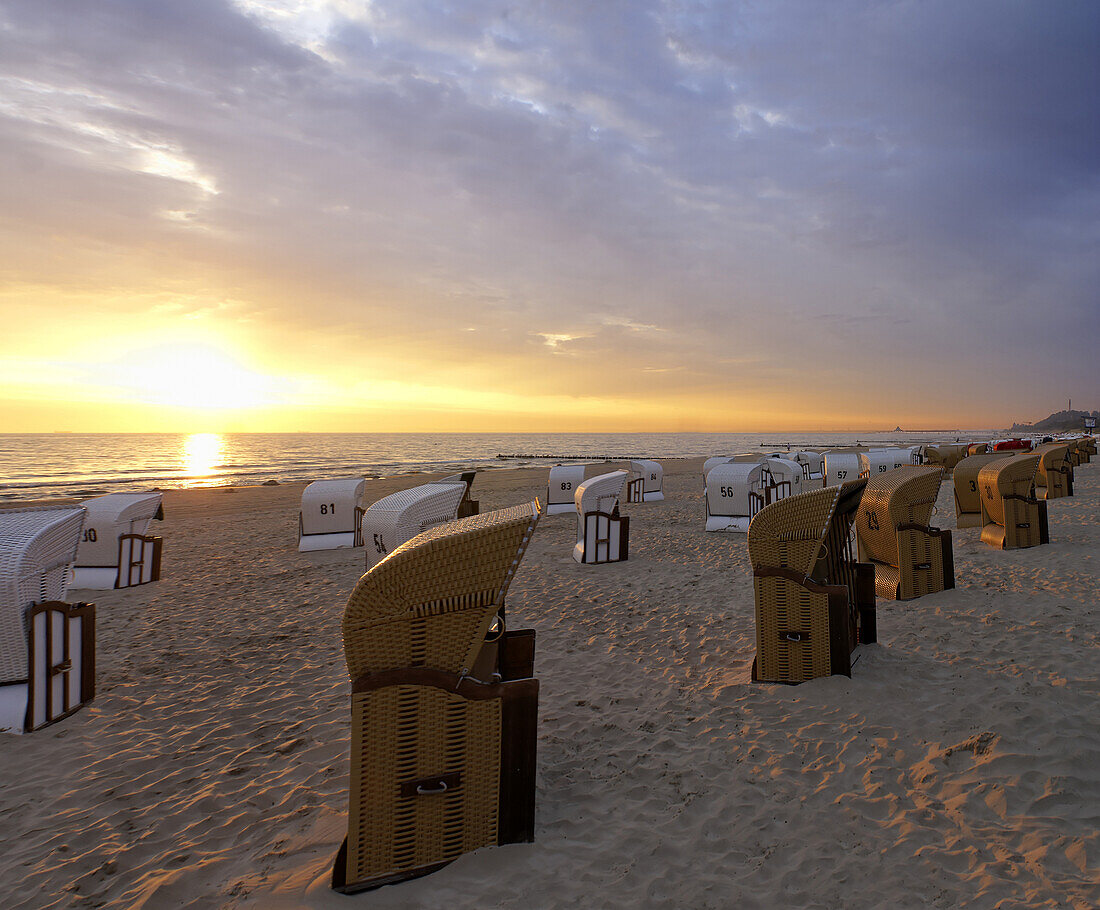 Beach chairs at beach in sunrise, Bansin, Mecklenburg-Western Pomerania, Germany
