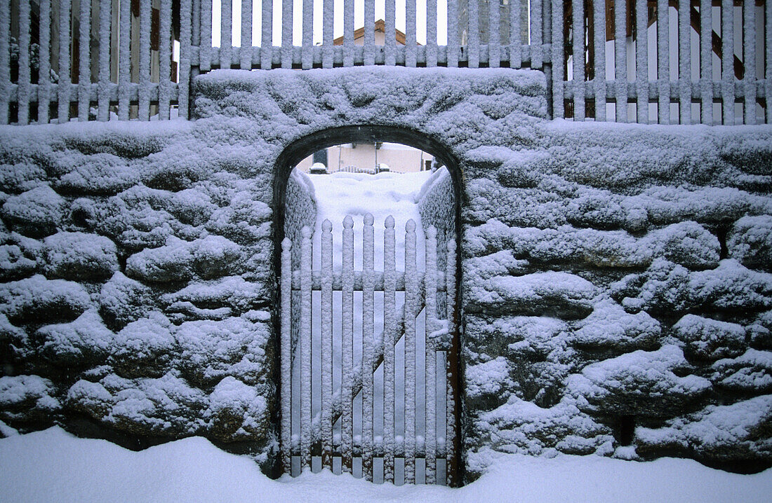 Snow covered gate, Sent, lower Engadine, Engadine, Grisons, Switzerland
