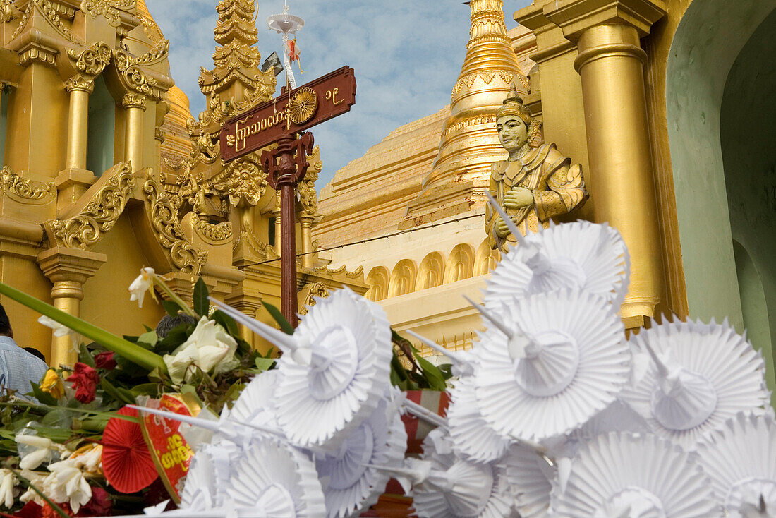 Oblations in the Shwedagon Pagoda at Yangon, Rangoon, Myanmar, Burma