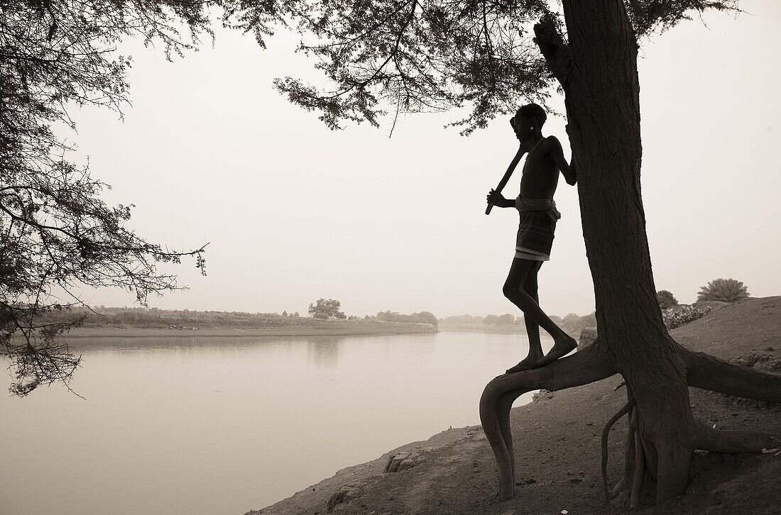 Dasanech man by Omo River. South Ethiopia