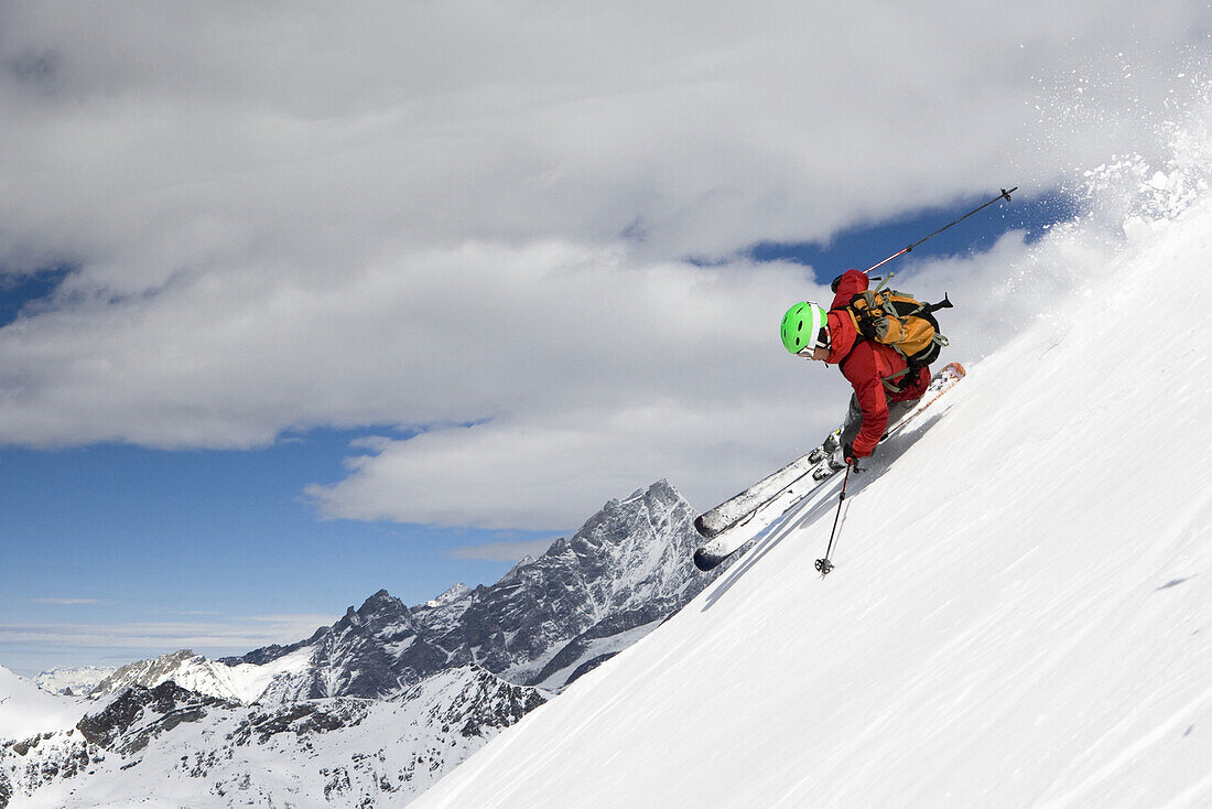 Young man downhill skiing, Stockhorn, Zermatt, Canton of Valais, Switzerland