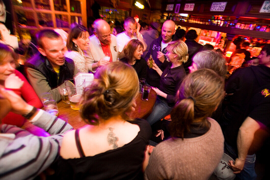 A lot of people in the Apres Ski bar Le Pub, Zinal. Wallis, Valais, Switzerland, Alps.