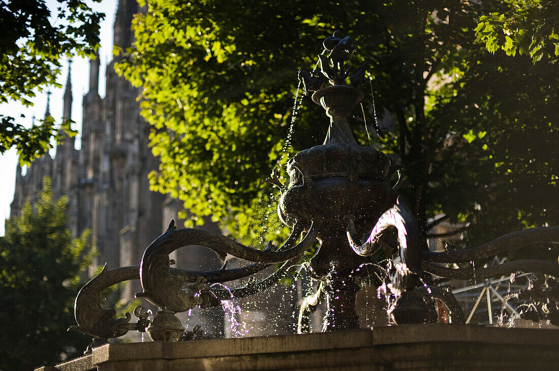 Fountain in the park, Church in the background, Ulm, Baden Wuerttemberg, Germany