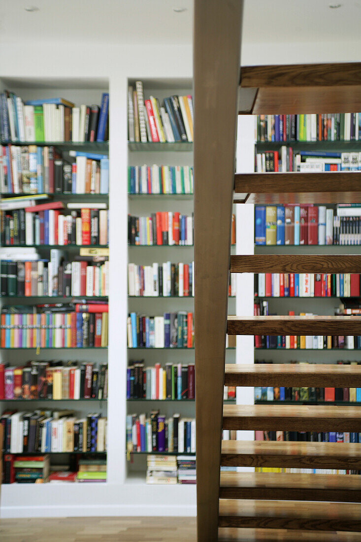 A bundge of books in bookshelves