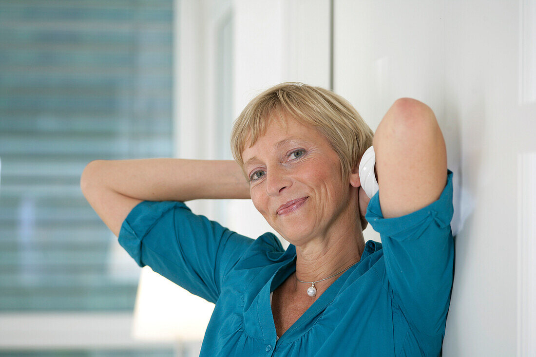 Mature woman smiling at camera, Styria, Austria