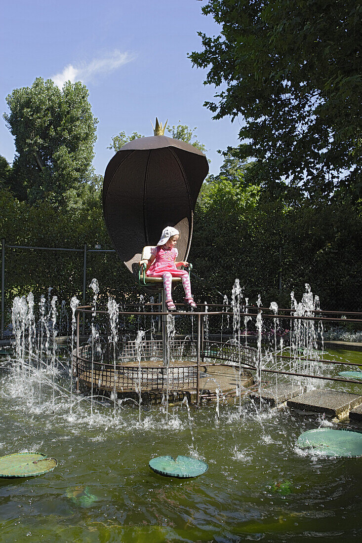 Girl sitting in a fountain, Flourishing Baroque, Fairy-Tale Garden, Ludwigsburg Palace, Ludwigsburg, Baden-Wurttemberg, Germany